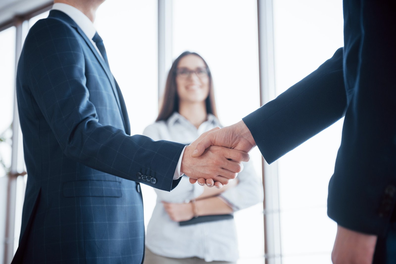 Business consultation handshake after a meeting