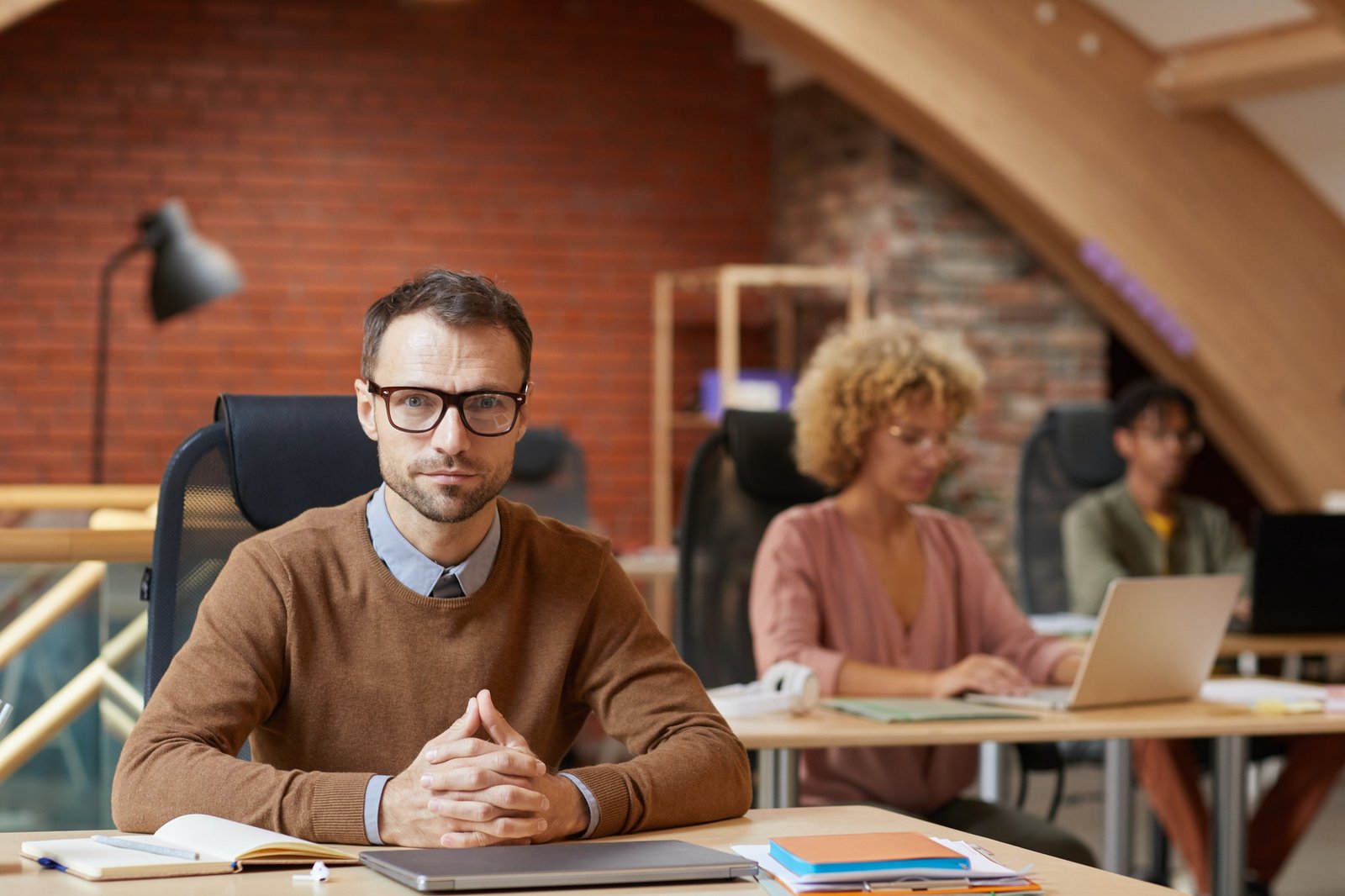 Tax and accounting advisor working at an office desk